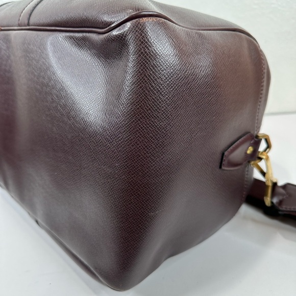 LV38 LOUIS VUITTON Taiga travel bag with strap - Picture 8 of 14